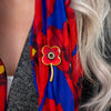 Gold Classic Stem Poppy Brooch worn on poppy scarf | Poppyscotland