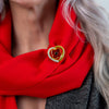 Heart Poppy Brooch worn on red cashmere blend scarf | Poppyscotland