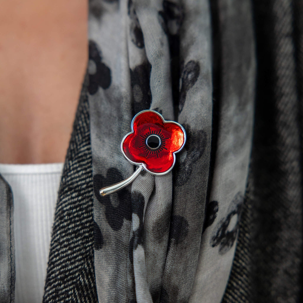 Silver Classic Stem Poppy Brooch worn on grey scarf | Poppyscotland